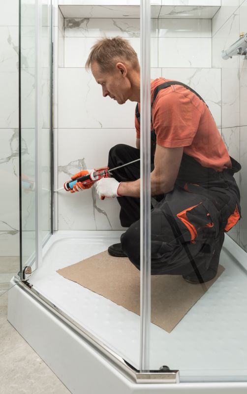 Professional installing a shower